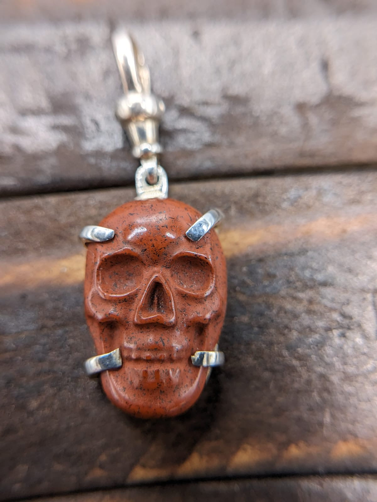 Hand Carved red jasper skull pendant sterling silver