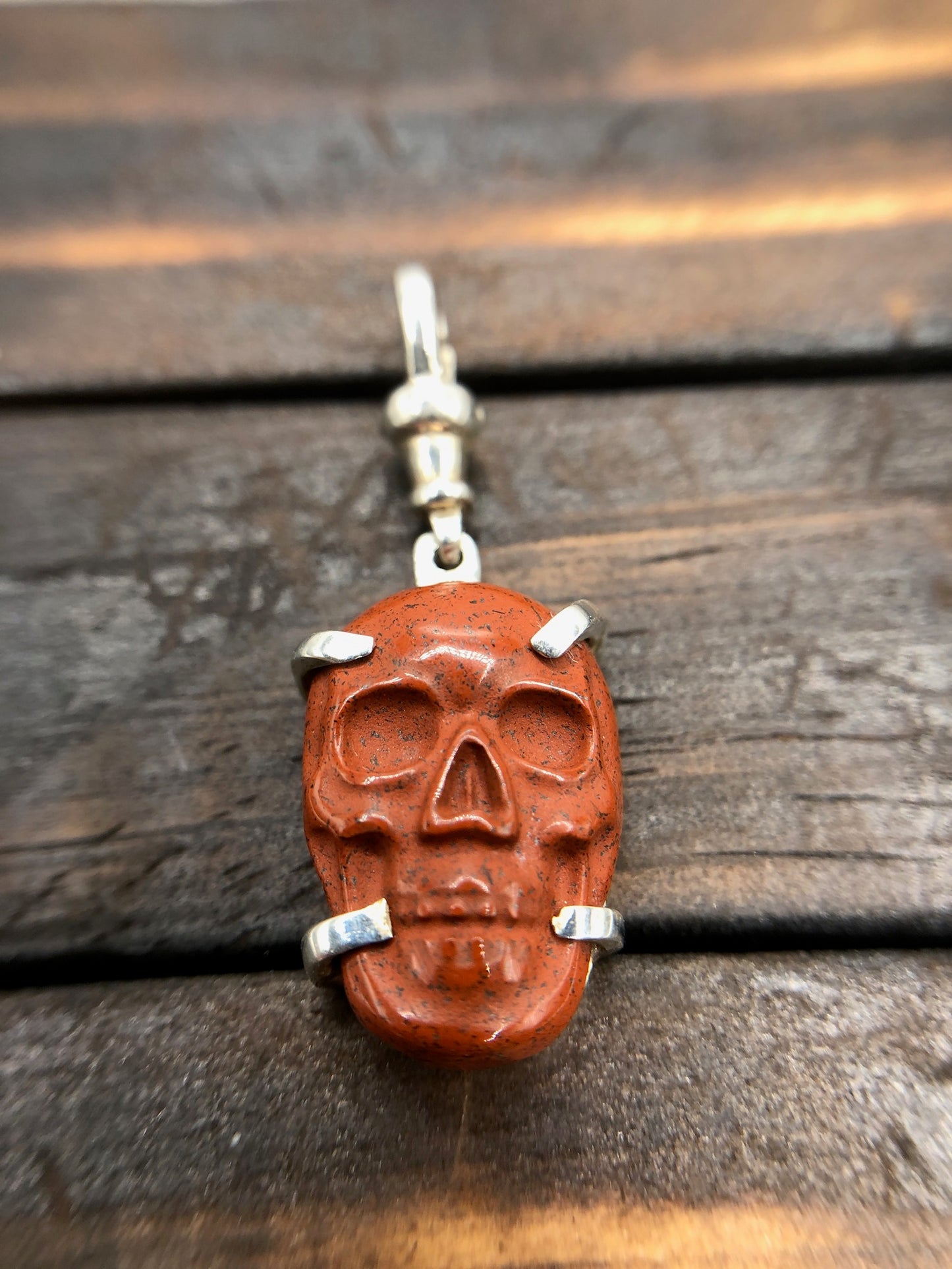 Hand Carved red jasper skull pendant sterling silver