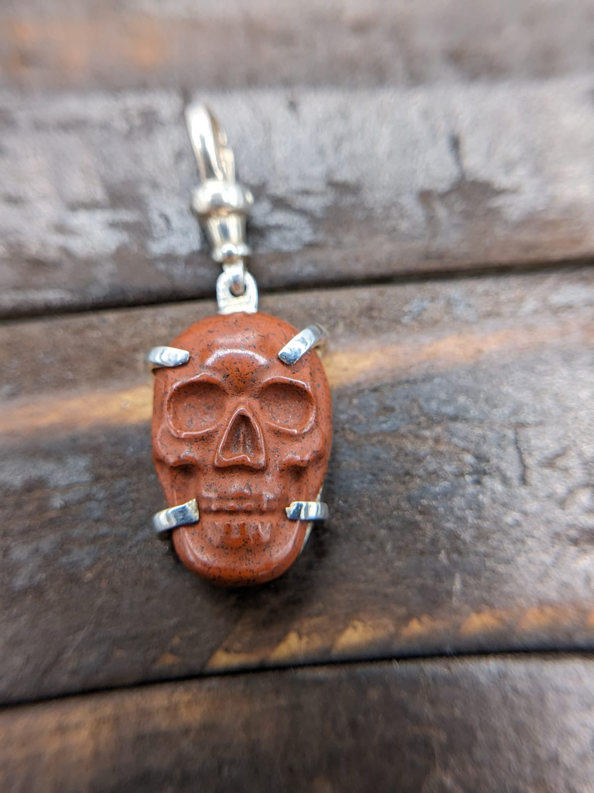 Hand Carved red jasper skull pendant sterling silver