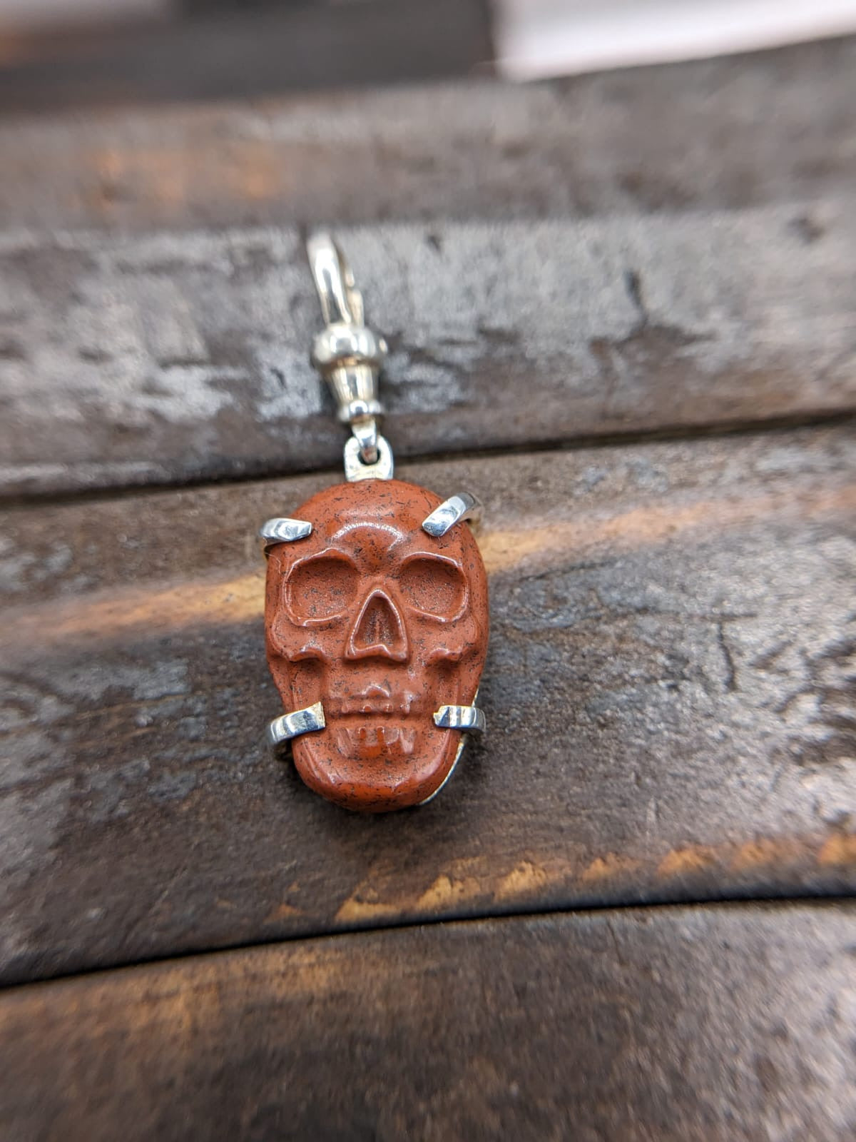 Hand Carved red jasper skull pendant sterling silver