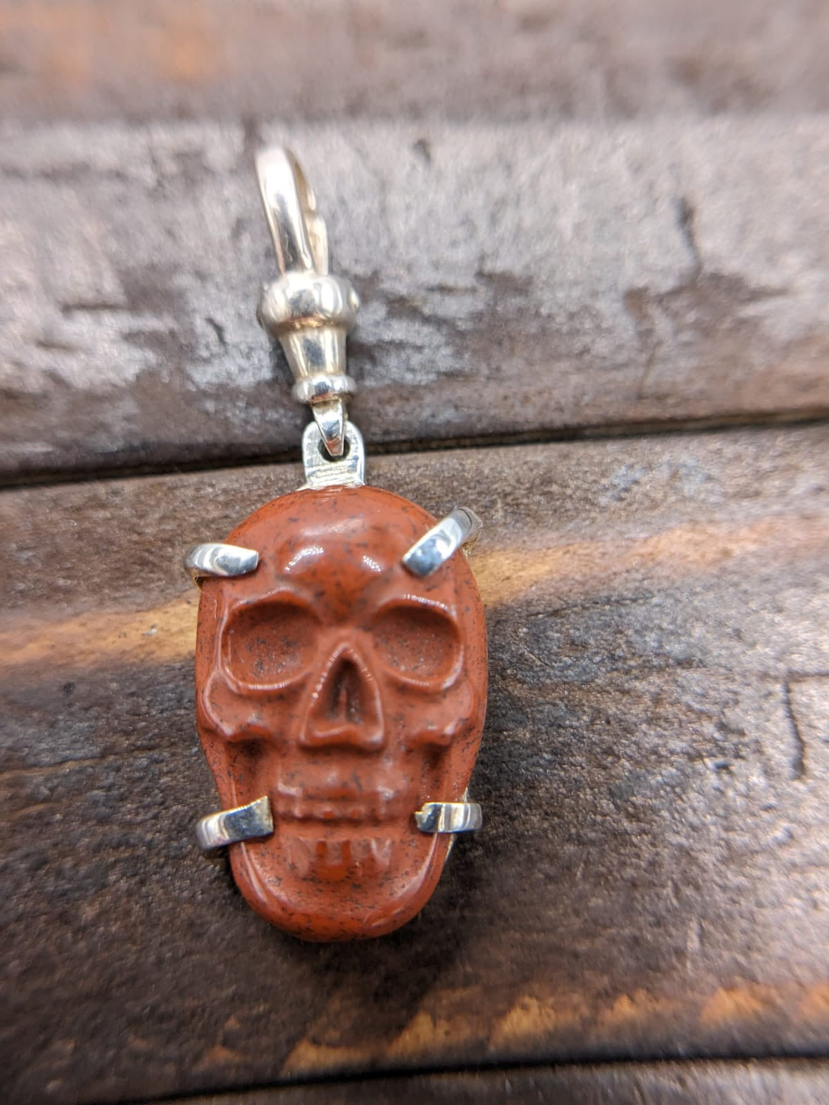 Hand Carved red jasper skull pendant sterling silver