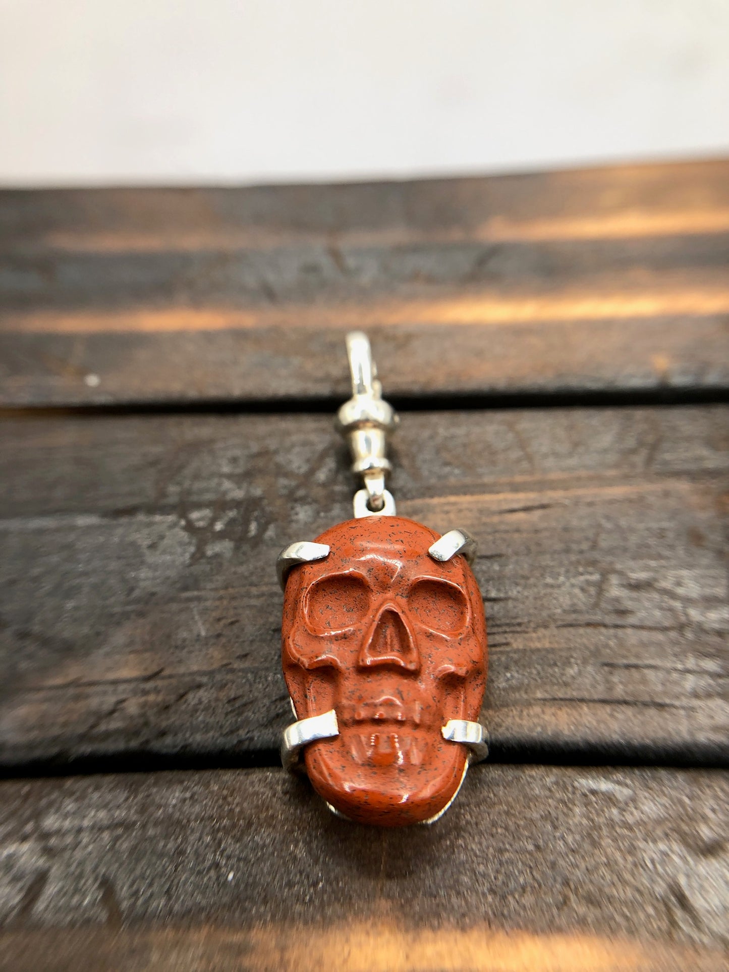 Hand Carved red jasper skull pendant sterling silver