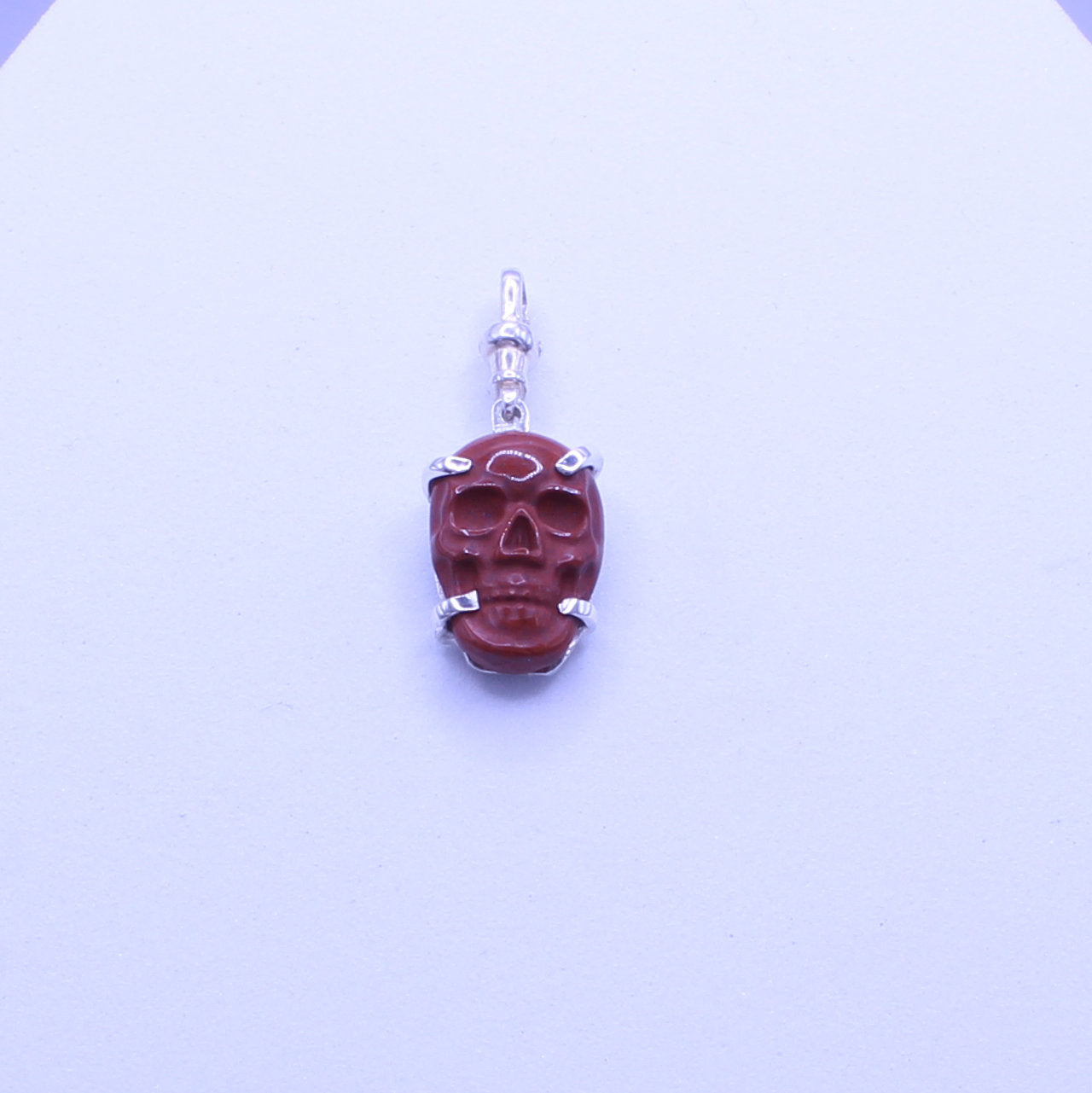 Hand Carved red jasper skull pendant sterling silver